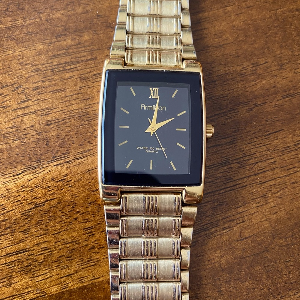 Golden colored watch for men